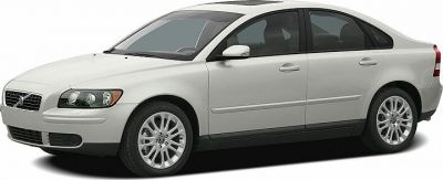 White sedan with front side view and alloy wheels