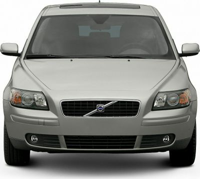 Front view showing grille, headlights, fog lights, and side mirrors.