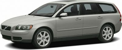 Silver wagon side profile with alloy wheels and roof rails