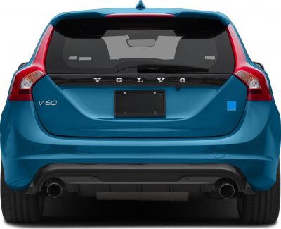 Rear view of station wagon with distinct taillights and twin exhaust pipes