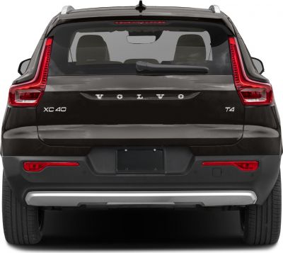 Rear view showing L-shaped LED taillights and rear hatch with badges and wiper