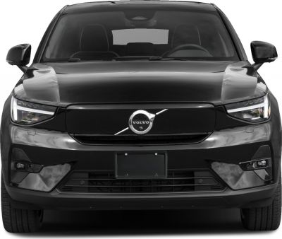 Front view showing grille, headlights, and Volvo emblem of electric SUV