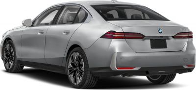 Rear view of sleek sedan with modern taillights and alloy wheels