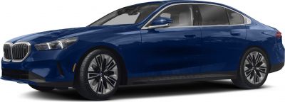 Side profile of a modern luxury sedan with distinctive headlights and alloy wheels