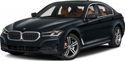 Front and side view of sedan with kidney grille and split headlights