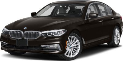 Front view with sleek headlights and multi-spoke alloy wheels