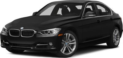 Front side view of sleek sedan with hybrid badge and alloy wheels