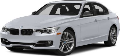 Front-side view of a sedan with sleek headlights and alloy wheels