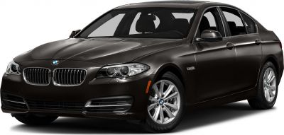 Front-side view of black luxury sedan with distinctive grille and headlights