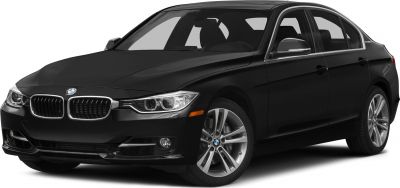 Black luxury sedan front-side with kidney grille and alloy wheels