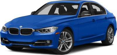 Front side view of a blue sedan featuring grille and alloy wheels.