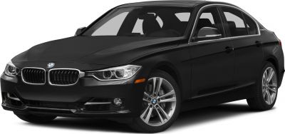 Black hybrid sedan front side view with kidney grille and alloy wheels