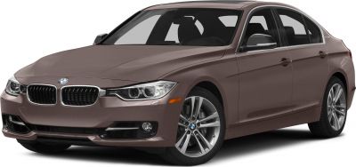 Front side view of a sedan with sleek headlights and alloy wheels