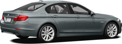 Rear and side profile of a luxury sedan with alloy wheels and shark fin antenna