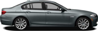 Side profile of a sleek sedan with alloy wheels