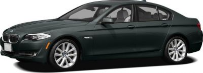 Side profile of BMW 5 Series Sedan with alloy wheels and sedan design