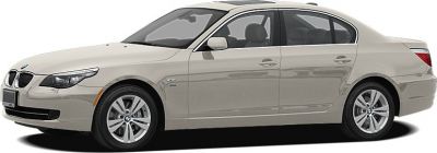 Side view of a sleek sedan with alloy wheels and four doors