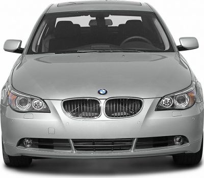 Front view of a silver car with kidney grille and dual headlights