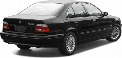 Rear side view with taillights and alloy wheels