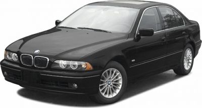 Black sedan with dual headlights, alloy wheels, and sunroof.