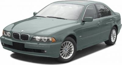 Four-door executive sedan with distinctive dual headlights and kidney grille