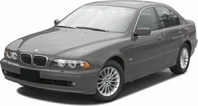 Sedan front-side view with dual headlight clusters and kidney grille