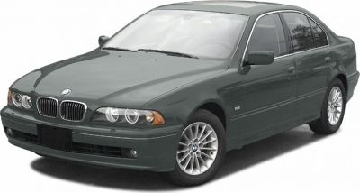 Front view of sedan with kidney grille and round headlights