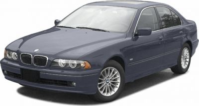 Front-left view of sedan with dual round headlights and kidney grille
