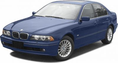 Front and side view of a classic sedan with kidney grille and round headlights