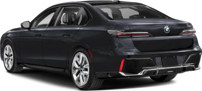 Rear view of a luxury sedan with modern tail lights and alloy wheels