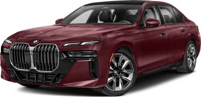 Prominent double kidney grille and sleek LED headlights on a maroon sedan