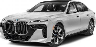 Prominent large kidney grille and slim LED headlights on a luxury sedan front.