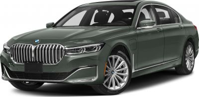 Front grille and side profile of a luxury sedan with multi-spoke wheels