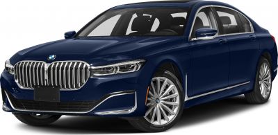 Luxury sedan front with large grille and sleek headlights