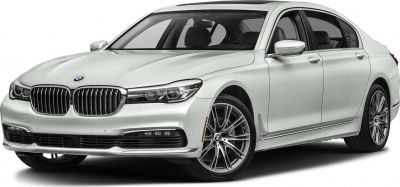 Front side view of a luxury sedan with kidney grille and LED headlights