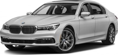 Front-quarter view of a luxury sedan with alloy wheels and distinctive grille
