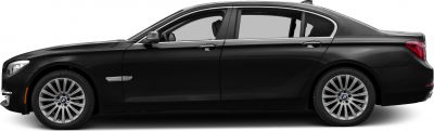 Luxury sedan side profile with multi-spoke alloy wheels and chrome trim