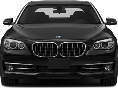 Front view with kidney grille and dual round headlights.