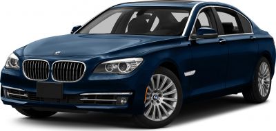 Front-side view of luxury sedan with prominent kidney grille and LED headlights