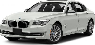 Luxury white sedan with kidney grille and multi-spoke alloy wheels