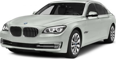 Luxury sedan front-side view with kidney grille and LED headlights