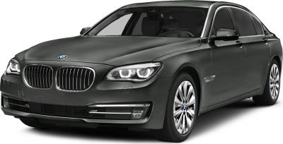 Front view of luxury sedan with LED headlights and kidney grille