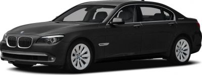 Luxury sedan front-side view with hybrid badge