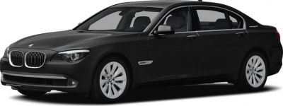Front side view of luxury hybrid sedan with kidney grille and sleek headlights