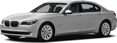 Front-side view of luxury hybrid sedan with sleek design and hybrid badge