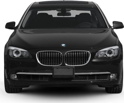 Front view of luxury sedan with kidney grille and dual headlights