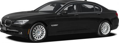 Black luxury sedan side profile with extended wheelbase and alloy wheels