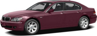 Side profile of luxury sedan with smooth body lines and distinct alloy wheels