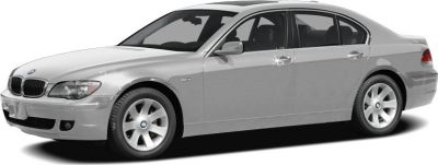 Silver luxury sedan side view with alloy wheels and four doors