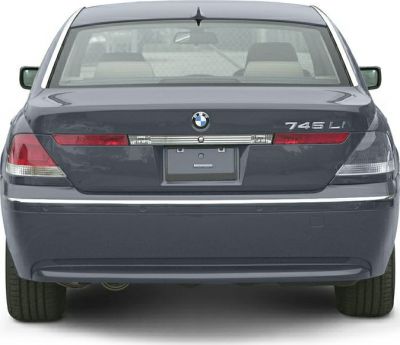 Rear view of luxury sedan with distinct taillights and chrome trim